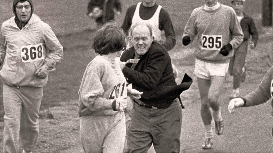 kathrine-getsgrabbed A man and woman running in the middle of a race.