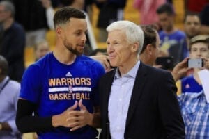 2017NBAFinalsGameOneJCevQQkdqgOl A man and a woman talking to each other.
